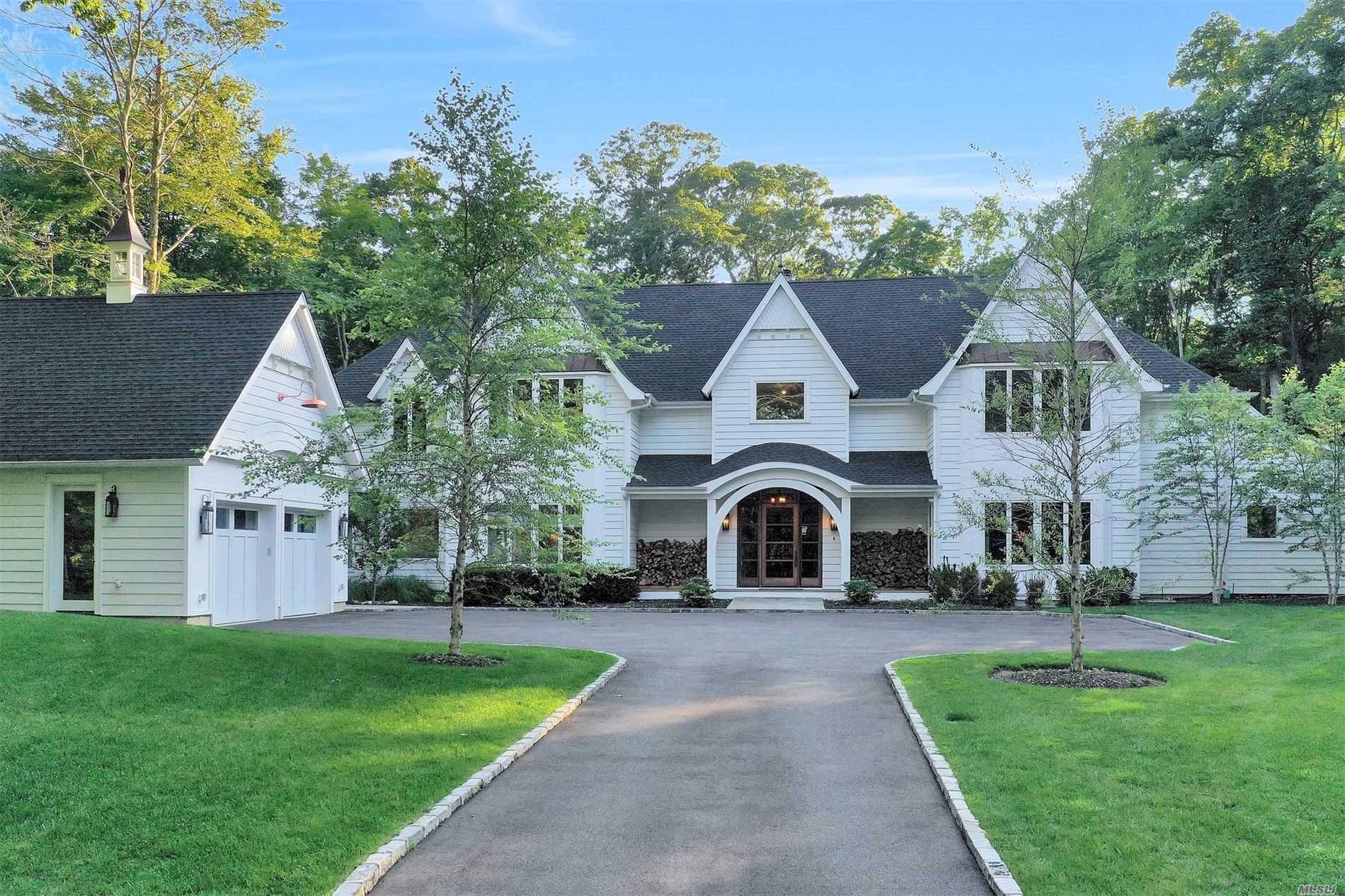 This Stunning Custom Built Colonial is Located In the Enclave Oyster Bay Cove on 2.