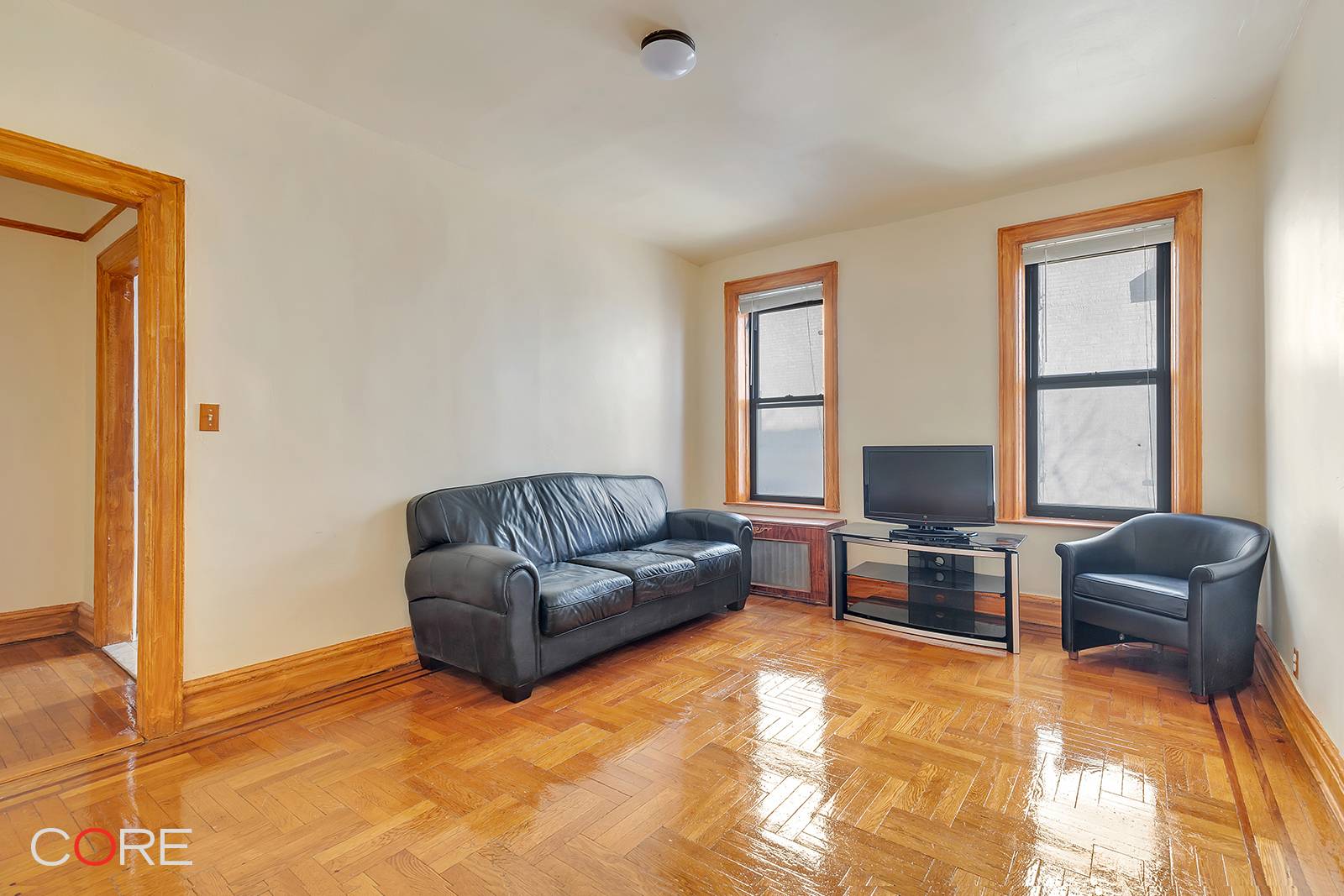 This large three room, pre war classic one bedroom apartment is nestled away from the street and has an abundance of sunlight.