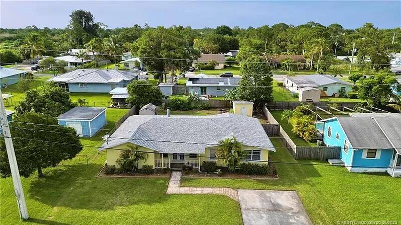 Inviting four bedroom, two bathroom home for sale in the heart of Palm City, Florida.