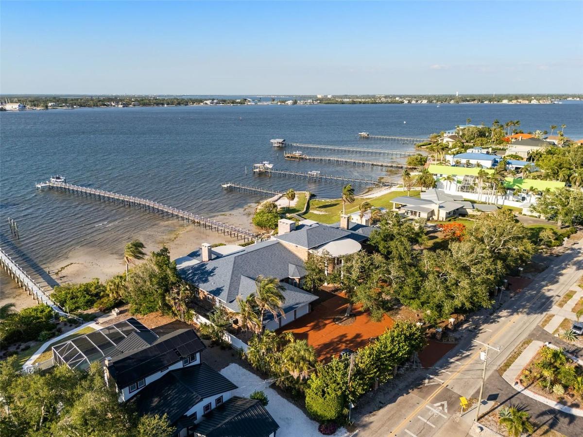 Sweeping northeast views overlook the Manatee River toward the Bradenton Yacht Club, offering a picturesque waterfront backdrop second to none.