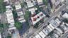 Aerial view of property and surrounding area with property parcel outlined