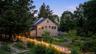 Warmly illuminated at dusk, the Broken Wing Barn invites memorable celebrations, performances, and gatherings throughout the year