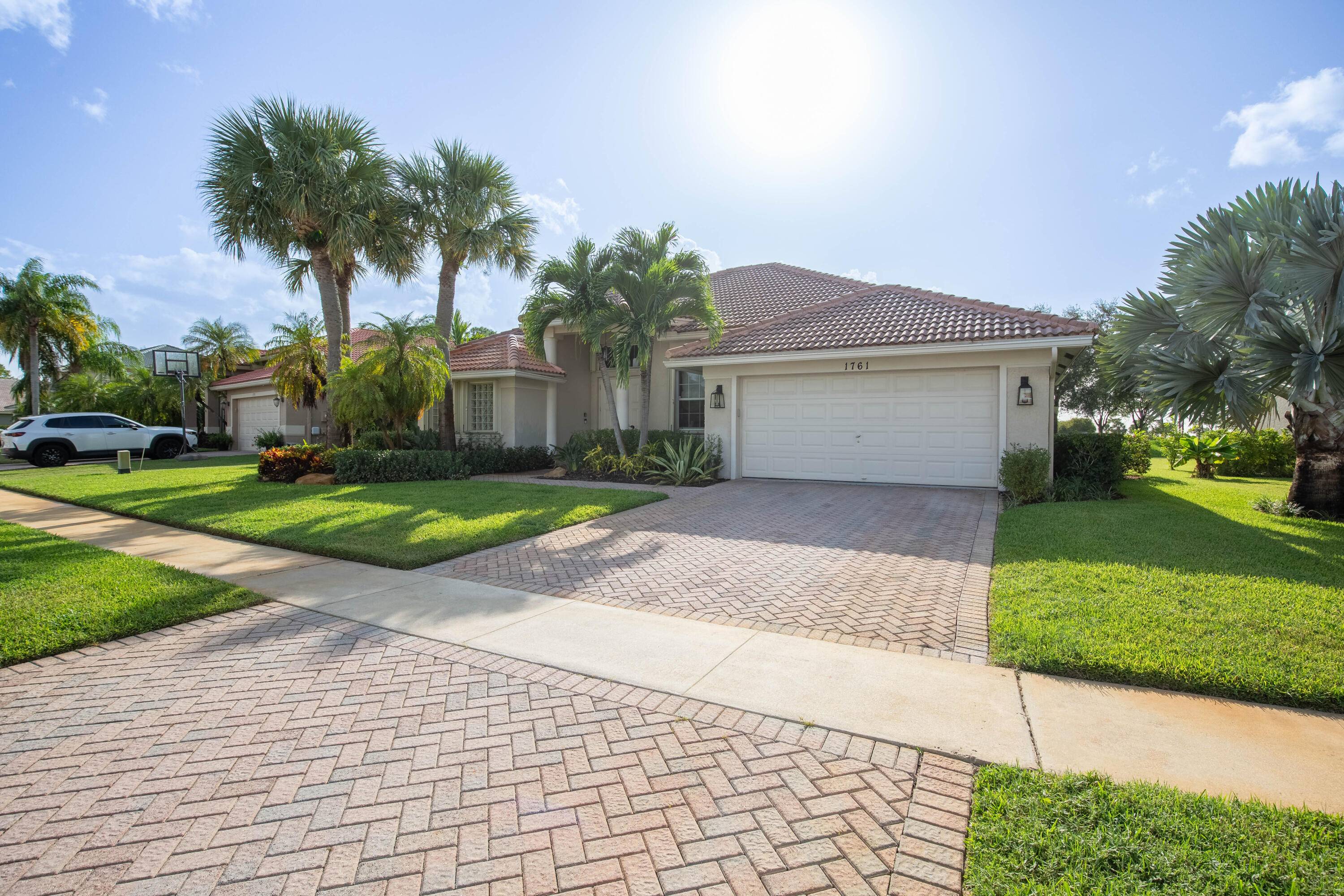 Welcome to your dream oasis in the prestigious gated community of Lakefield West, nestled in the heart of Wellington, FL.
