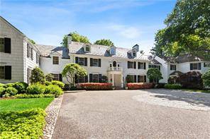 Meticulously renovated New Canaan compound exudes the quintessential New England elegance combined with every modern amenity and mechanical one could imagine.