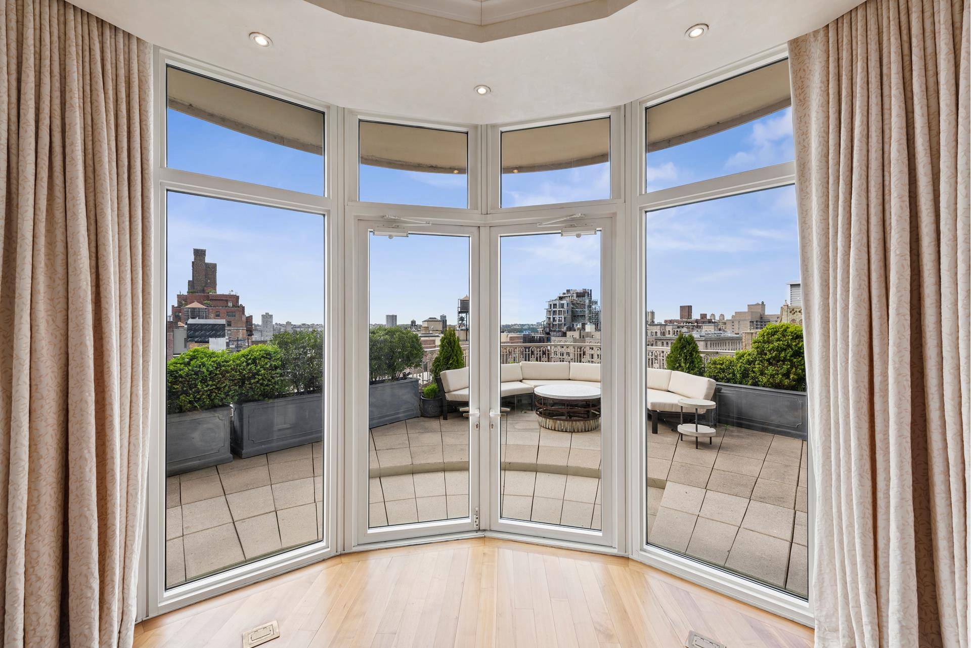 Penthouse perfection awaits at The Laureate with one of the most enviable outdoor spaces in the neighborhood !