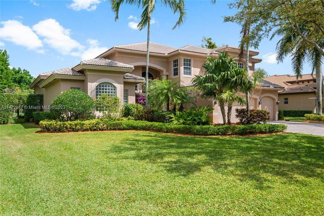 Exquisite lake home situated in the prestigious gated community of Long Lake Estates.