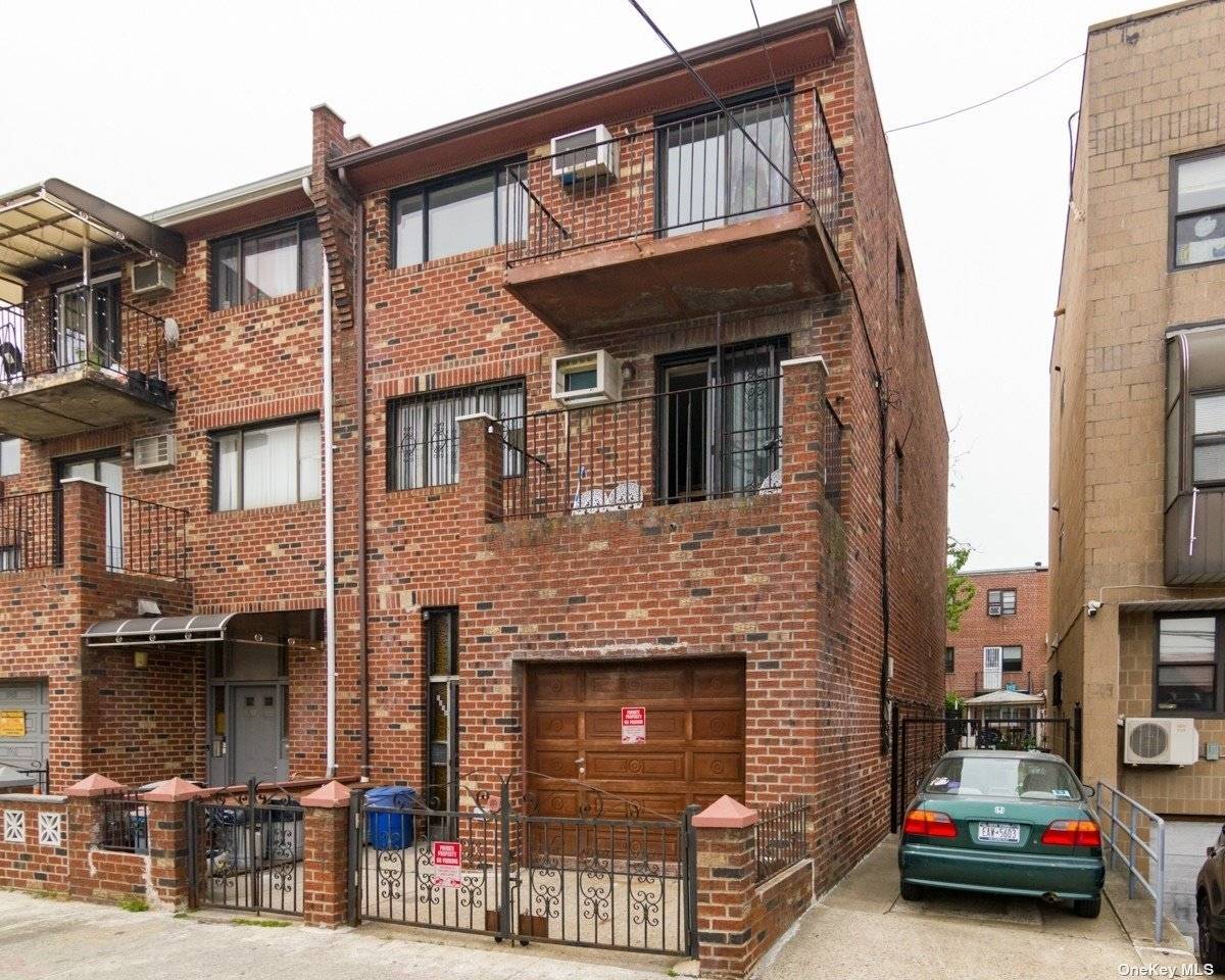 DELIVERED VACANT. Beautiful brick 3 family with legal basement located in Woodside.