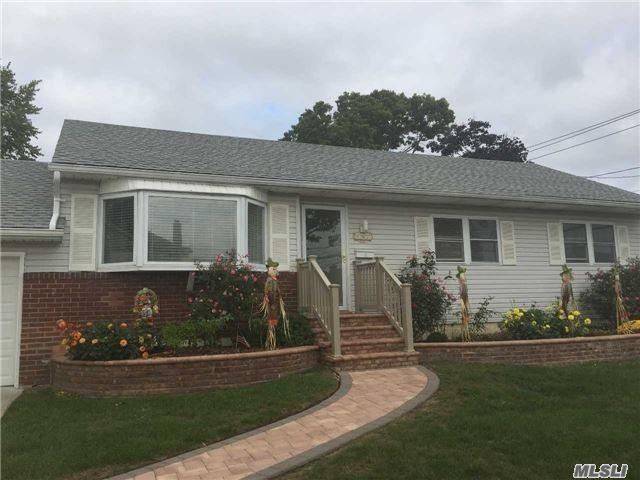 Cozy 3 bedroom ranch style home located on a corner lot on a residential street in Massapequa Park.