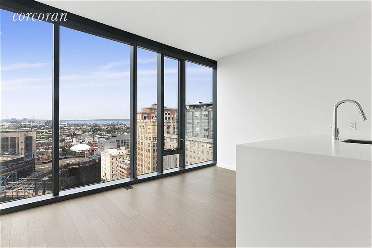 Amazing one bedroom home with wall to wall floor to ceiling windows !