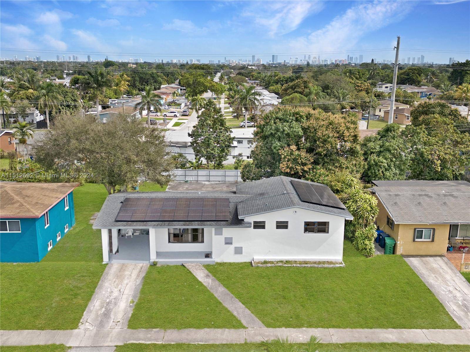 Step into this renovated four bedroom, two bathroom home nestled in Miami Gardens.