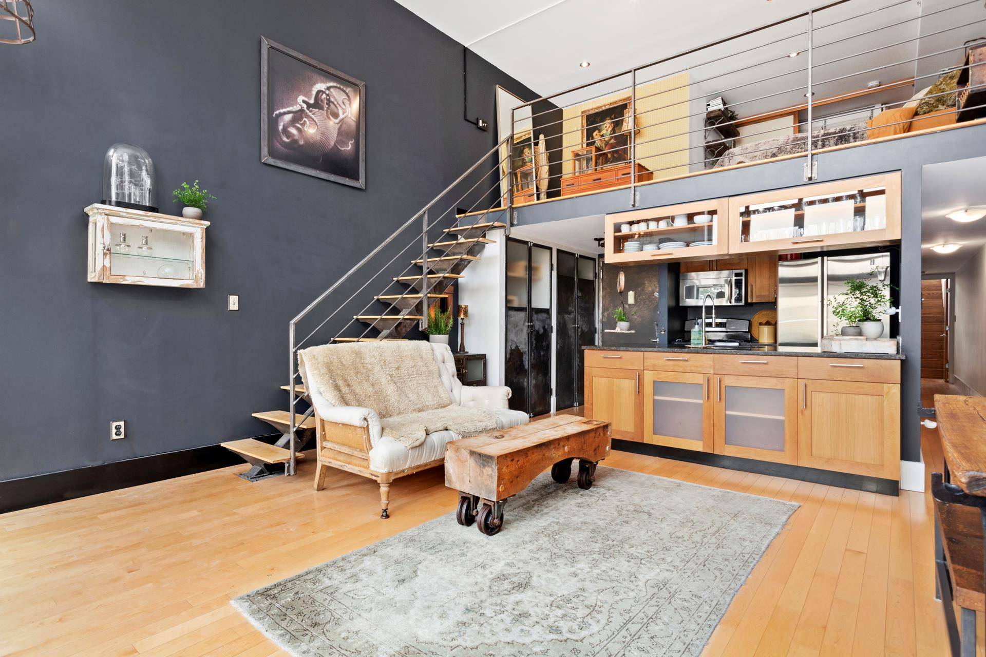 This is a mint condition triple exposure N S W loft style duplex with approximately 1, 250 square feet inside, three balconies and an additional 250 SQFT private roof deck ...