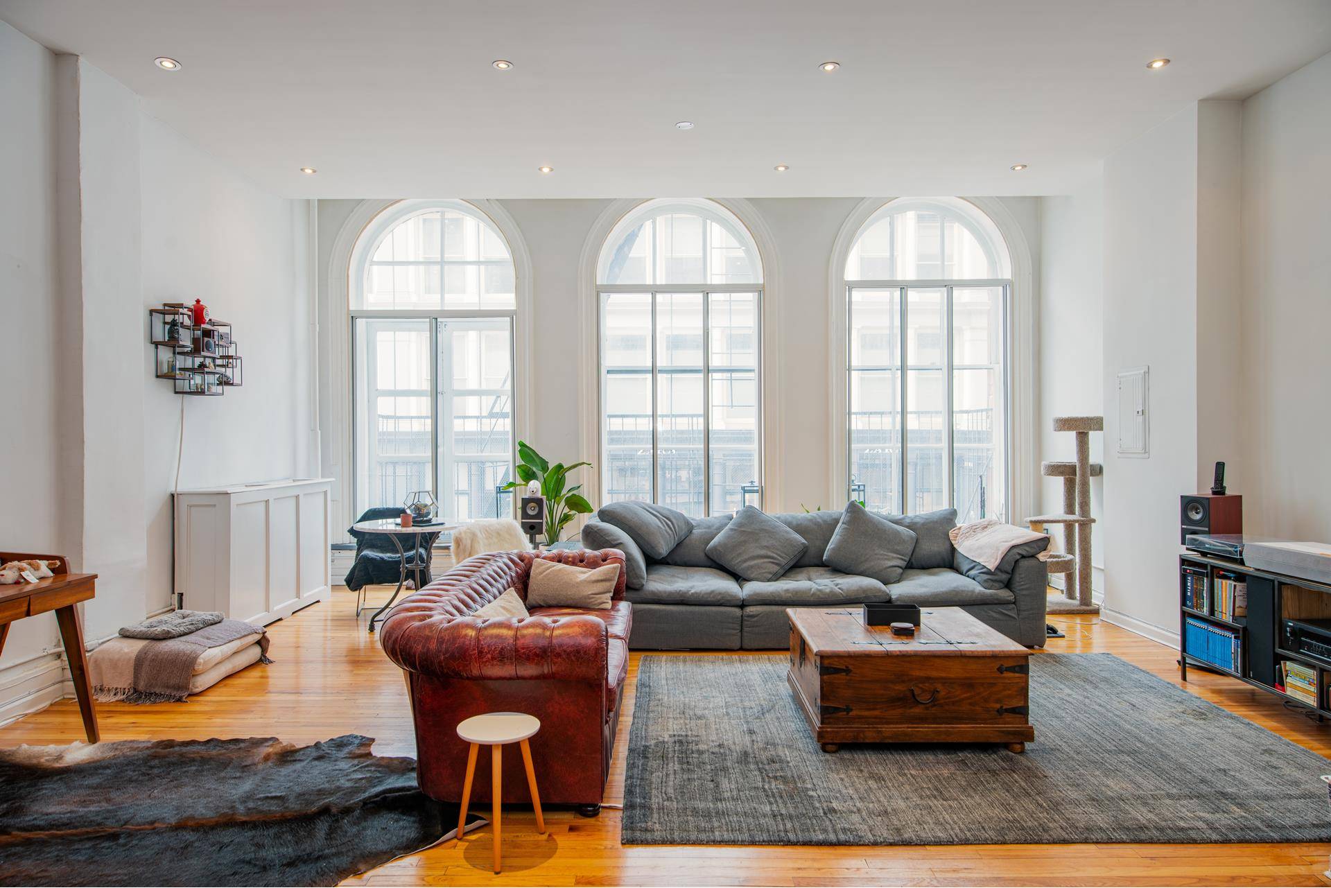 Authentic massive, full floor Loft offering 13 foot ceilings and large windows allowing for excellent natural light through double exposures in the heart of SoHo between Spring and Broome.