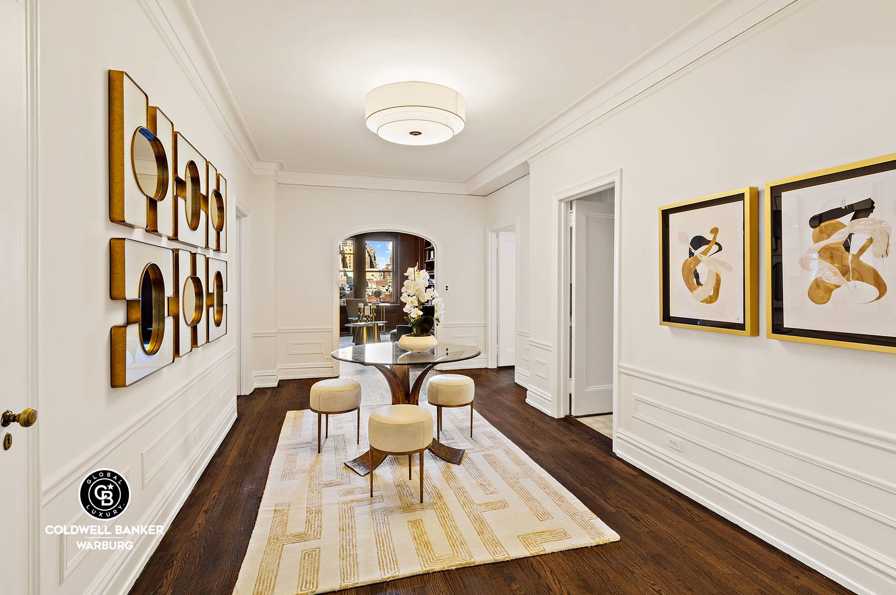 The expansive gallery leads to a stunning and sophisticated oversized living room with a WBF, a truly elegant dining room with beautiful exposure, and a perfectly placed and proportioned library.