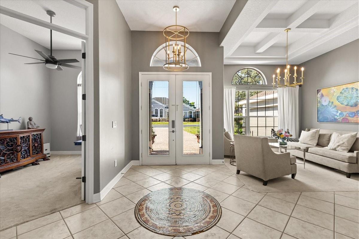 Front entryway with updated chandelier. Your office/flex room is to your right when entering the home