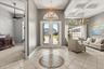Front entryway with updated chandelier. Your office/flex room is to your right when entering the home