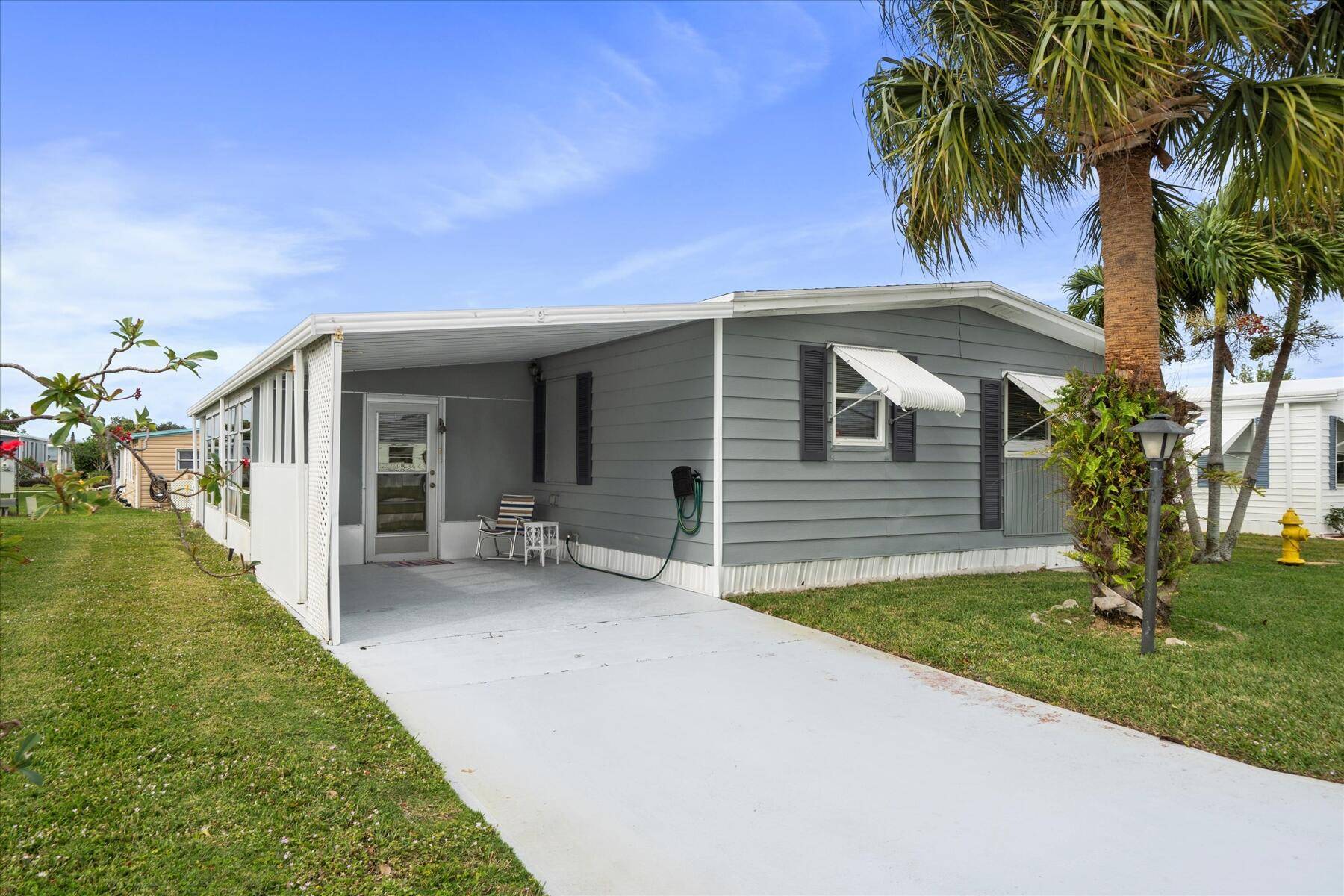 Come check out this spacious 2 2 mobile home located in the much desired 55 community of Pinelake Village in Jensen Beach.