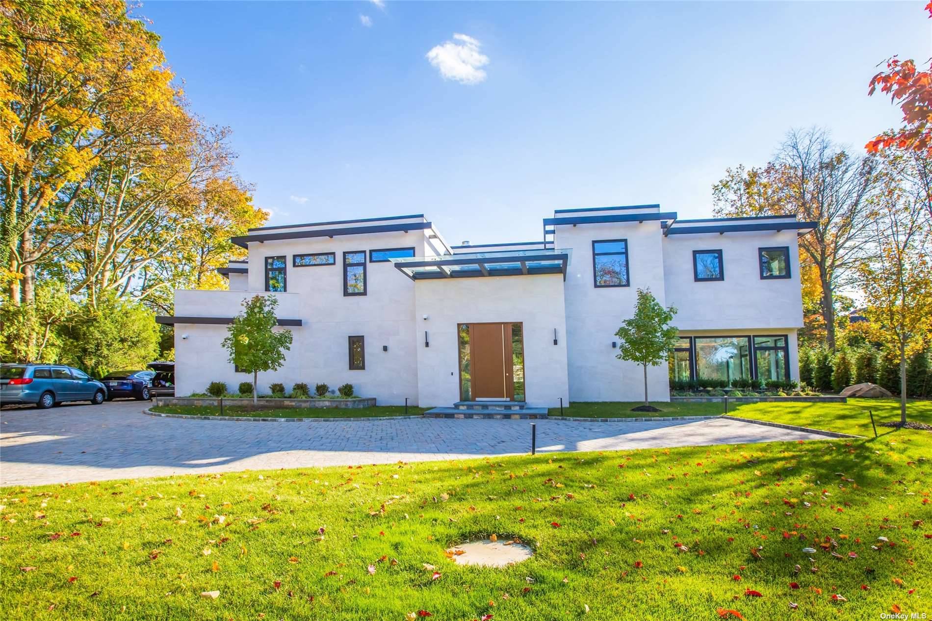 Nestled on East Shore RD in Kings Point along gold coast, It is a stunning modern, Band New contemporary residence custom built to emphasize exquisite views of the Long Island ...
