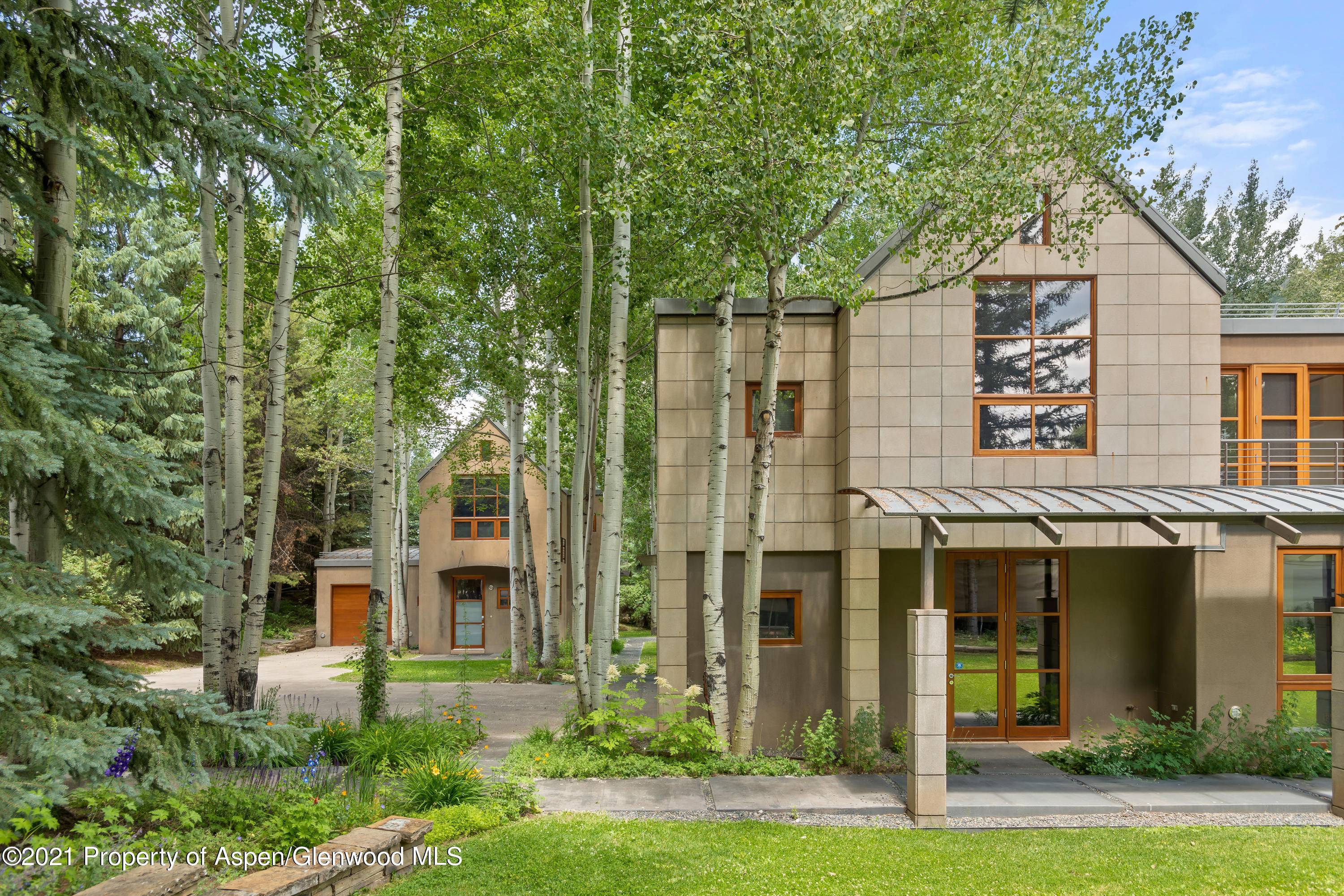 There exist only 21 homes in Aspen's famous West End neighborhood that overlook the Hallam Lake Nature Preserve.