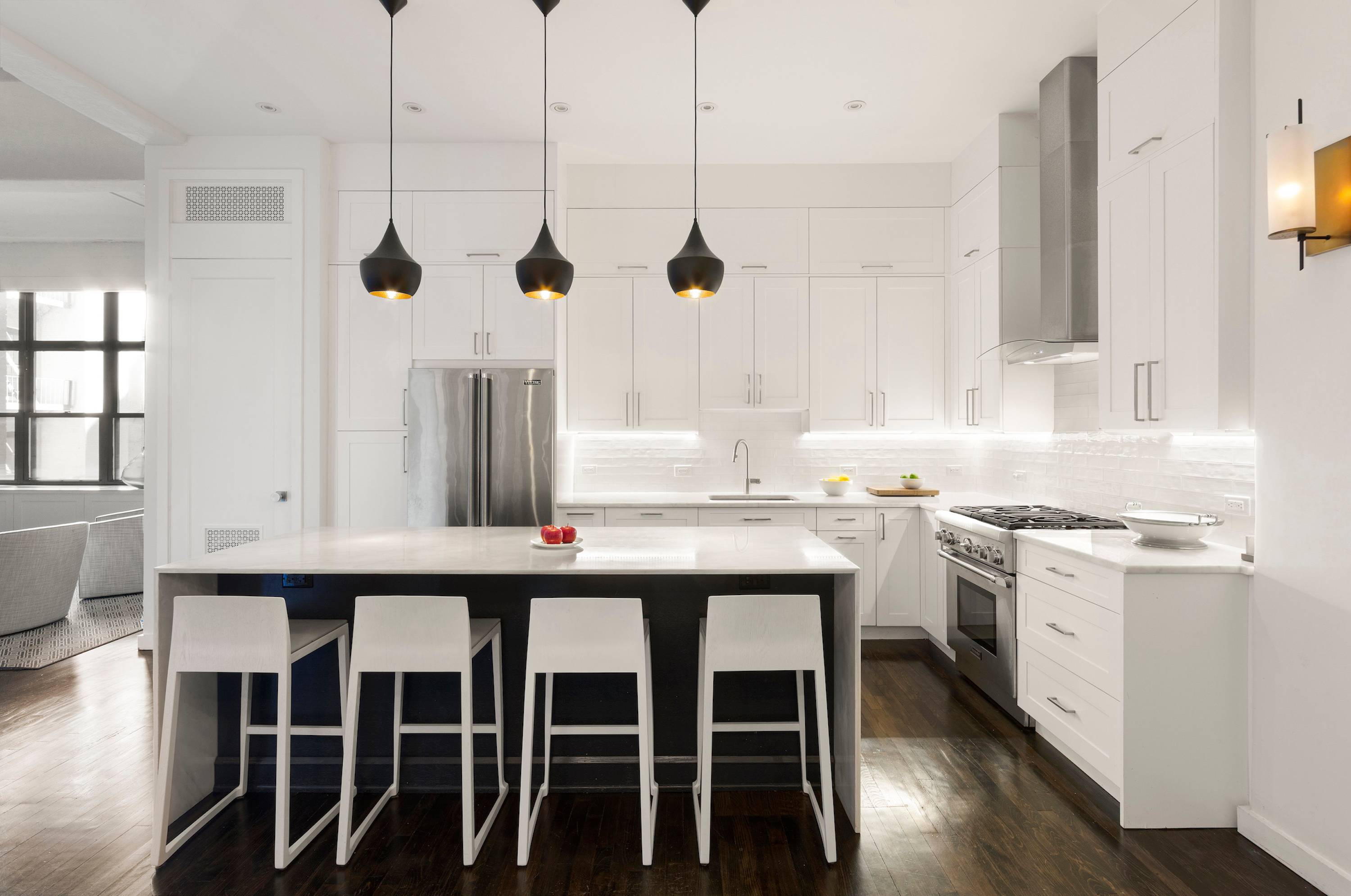 Meticulously renovated with chic, modern details, this pin drop quiet three bedroom, two bathroom plus den home is the perfect city sanctuary where Chelsea meets the West Village.