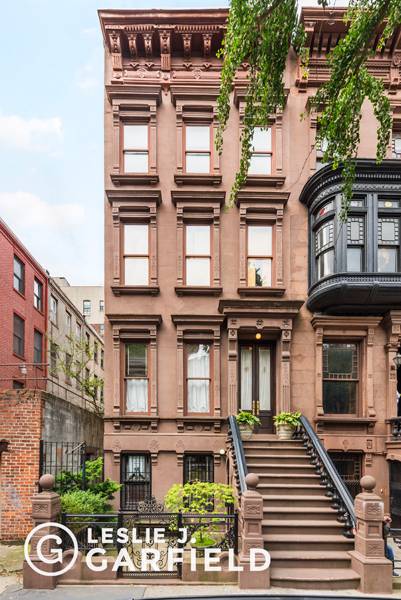 Located on a picturesque tree lined block in the charming Mount Morris Park Historic District, 2 West 123rd Street is a single family Neo Grec style townhouse designed by architects ...