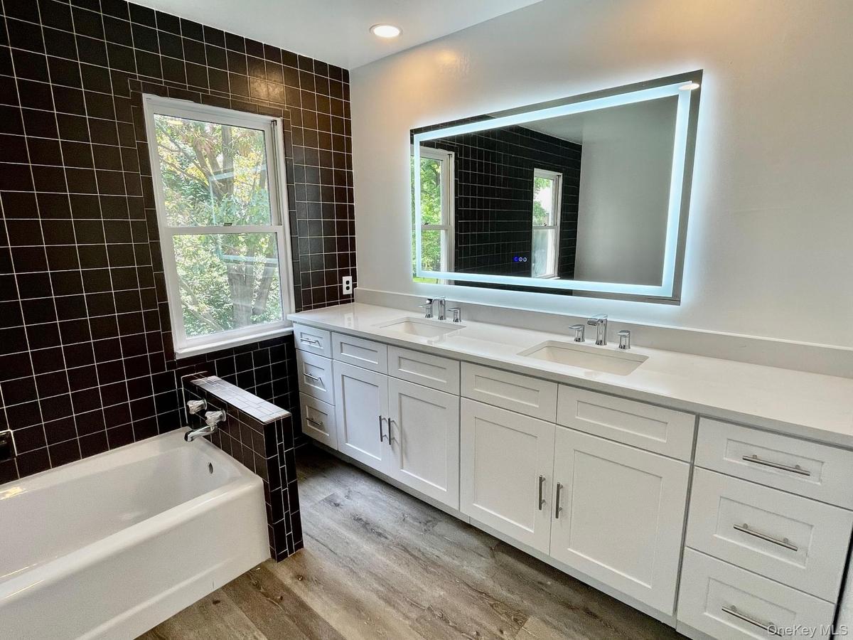 Primary bathroom with double sink vanity