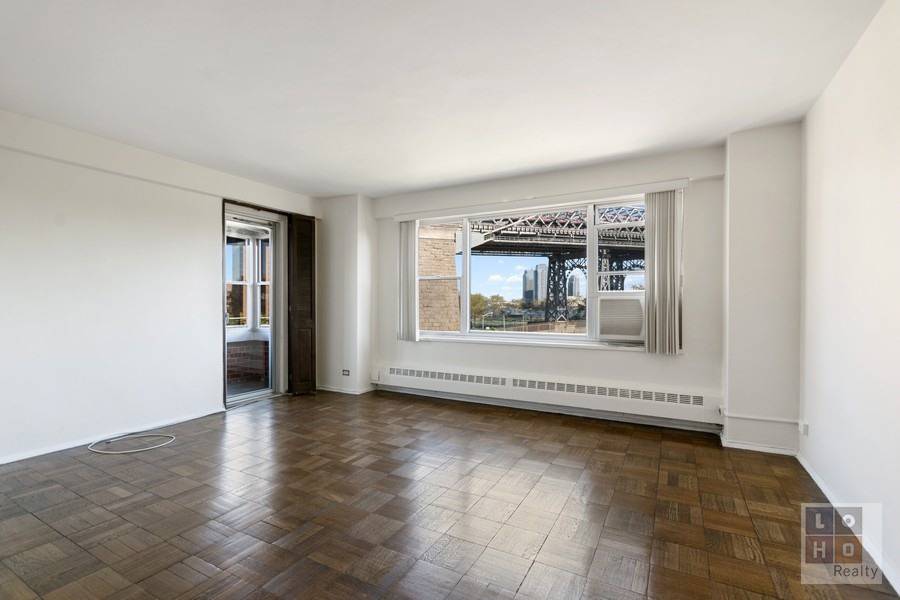 Spacious 2 bedroom with balcony apartment with eastern views AND great renovation potential !
