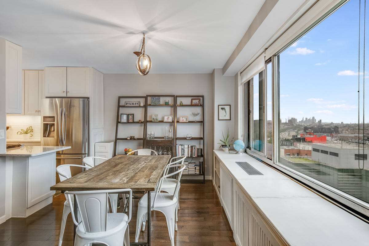 Perched high on the 14th floor, light abounds in this beautifully renovated home.