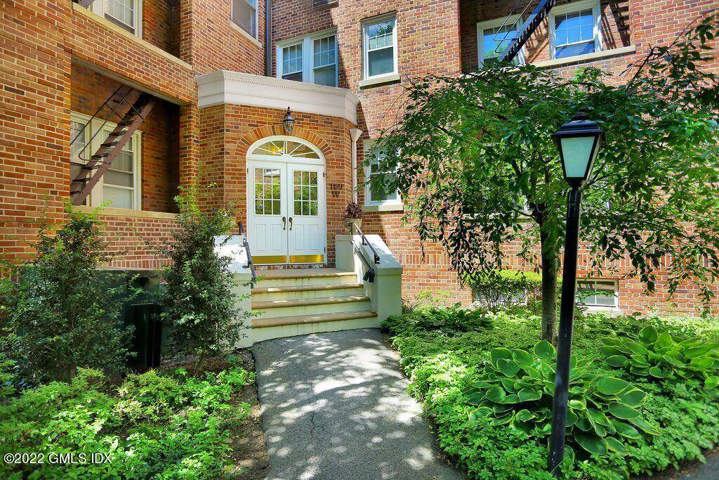 Recently renovated, meticulously maintained condominium situated in an elegant brick colonial building with elevator and intercom offers carefree living in the heart of town.