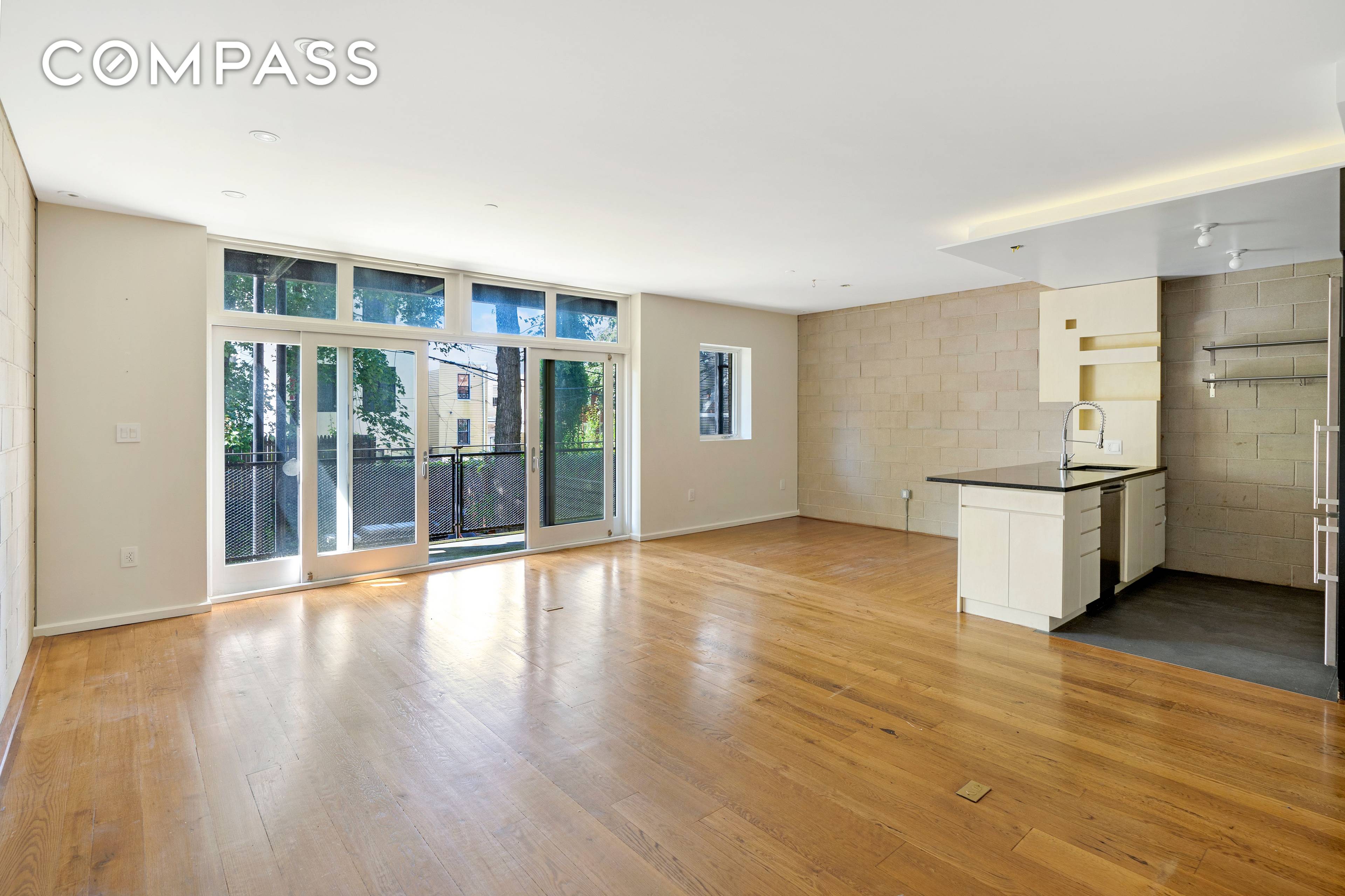 Modern and bright, this two bed two bath home, with a large garden facing balcony, is situated on a tree lined street in the heart of Greenwood Heights.