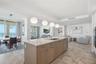 Kitchen island with seating and abundant prep space.