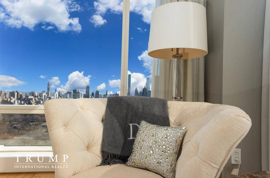 Upon entering this lovely home, you are greeted with bright, natural light and an open floorplan with spectacular views of Central Park and Columbus Circle !