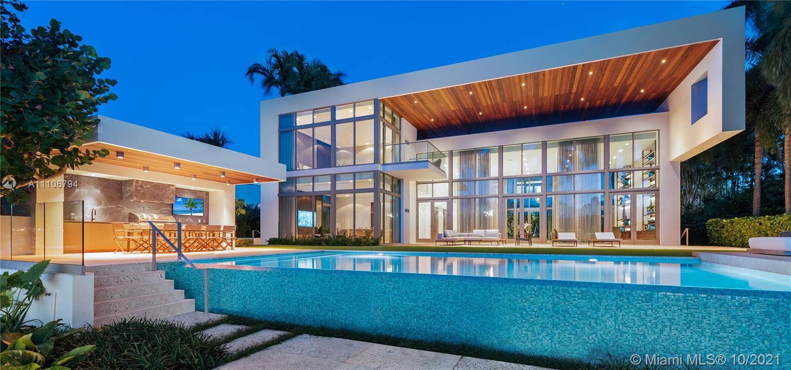 Stunning sunsets, prestigious North Bay Rd modern waterfront home by the AquaBlue Group.