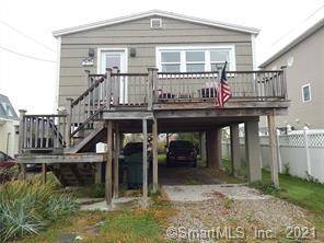 Just steps to Silver Sands Beach and Silver Sands State Park from this lovely, raised, single family home in beach community.