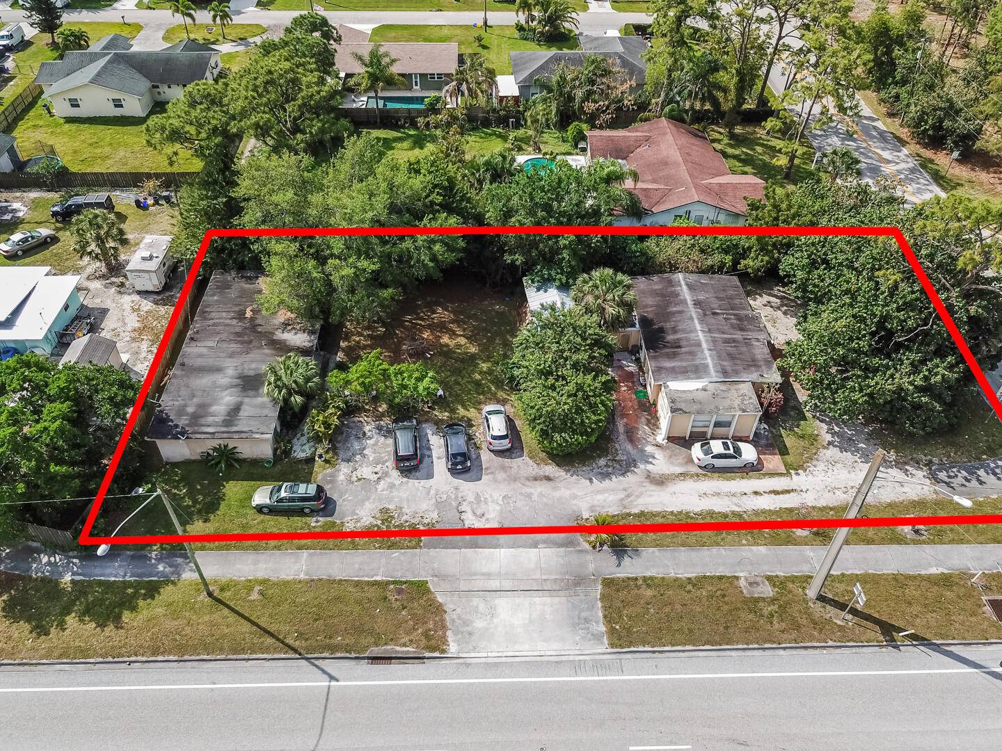 Great opportunity for a single family home and a duplex on almost 1 2 acre lot on Lake Worth Road and The Turnpike.