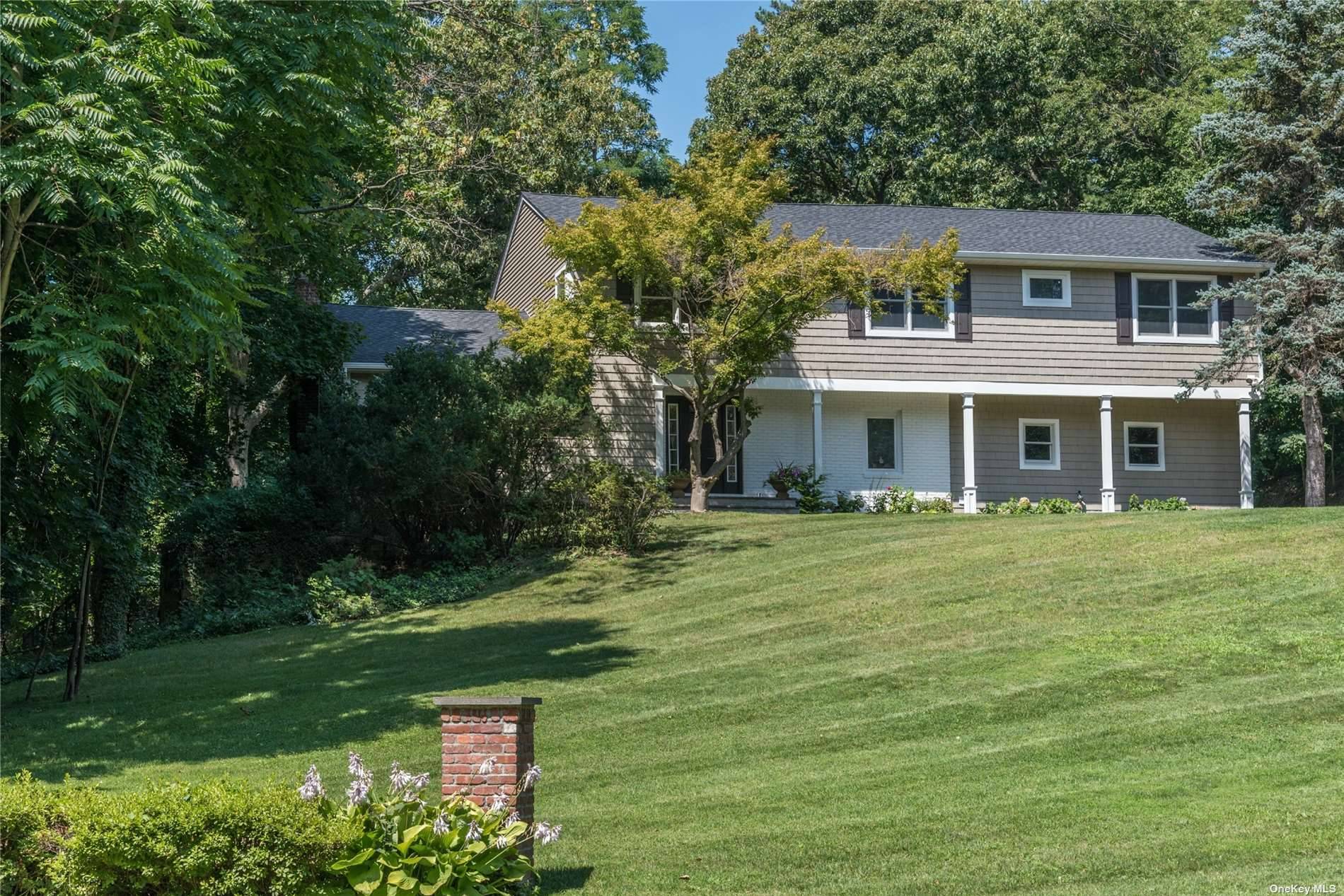 LATTINGTOWN. Completely redone and renovated Colonial situated on over 2 acres in Lattingtown.