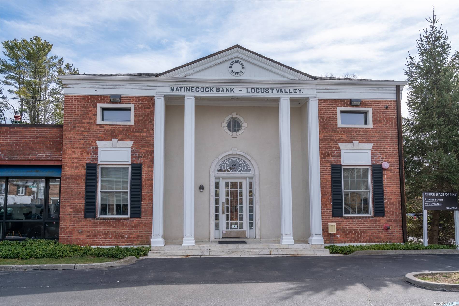 The iconic Locust Valley Bank Building, now available for sale.
