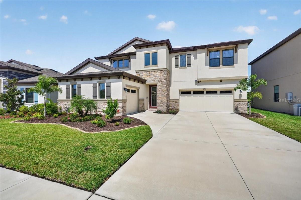 Stunning WestBay Belmar residence with sophisticated architectural details and impressive curb appeal