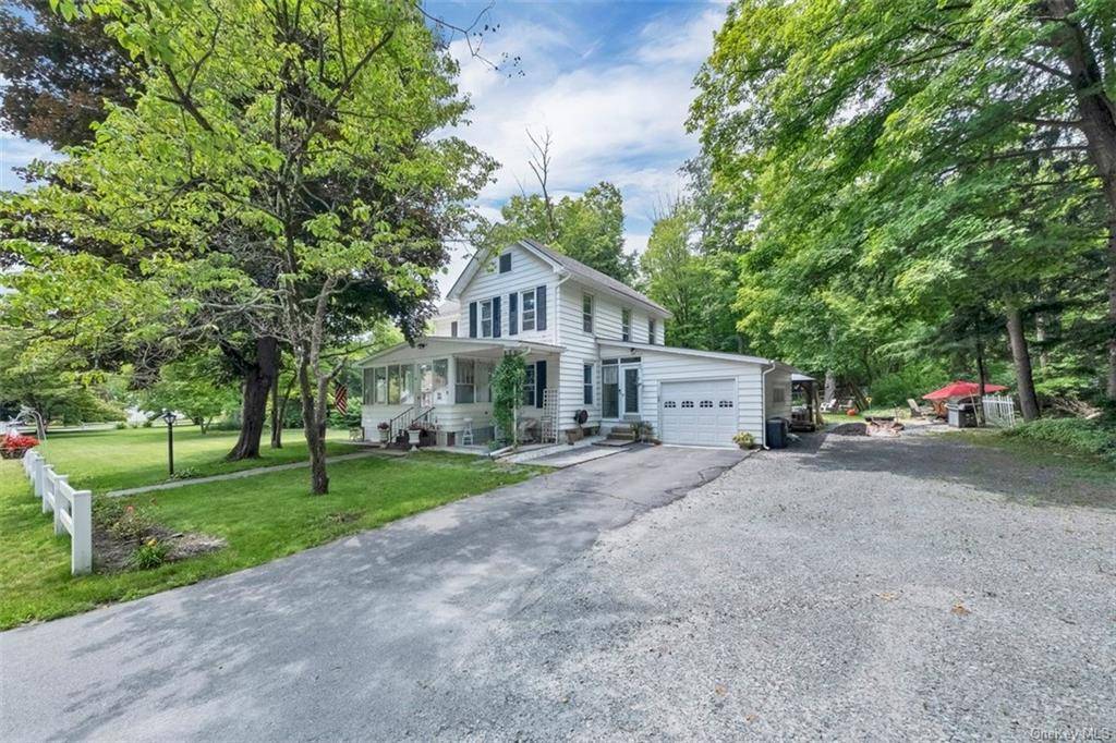 This lovely turn of the century farmhouse sits on a private oversized, level corner lot on a quiet dead end street in the heart of the Historic village of Wurtsboro.