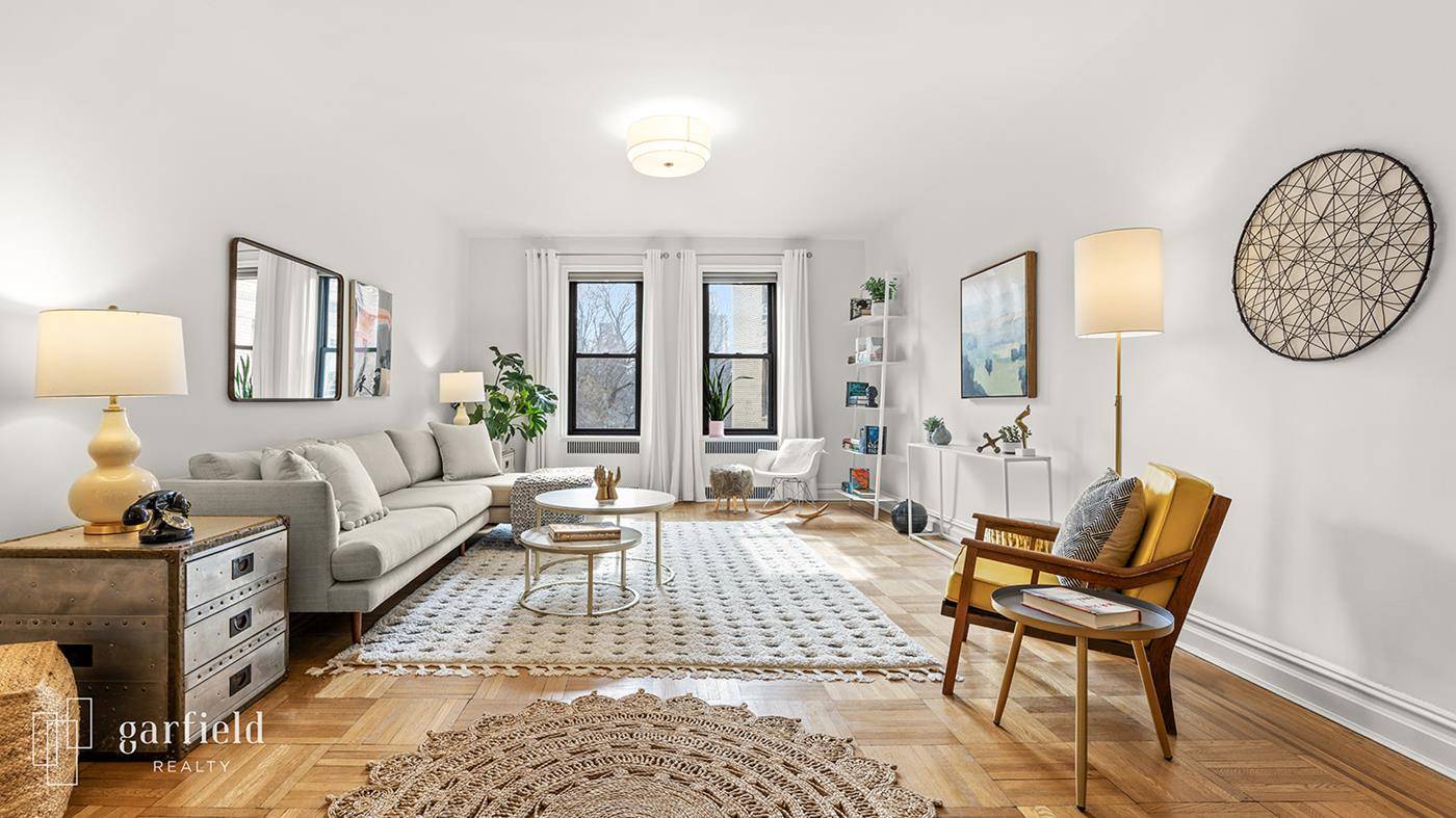 Serene, beautifully renovated, and filled with natural sunlight, this sprawling 2 bedroom, 2 bathroom home is perched on a high floor of a coveted full service elevator doorman building on ...