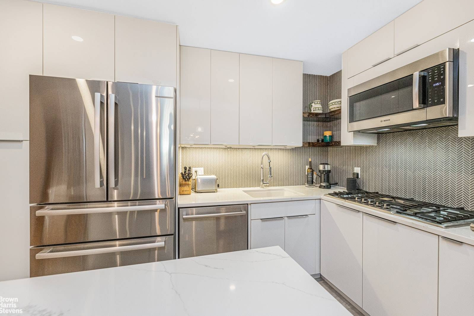 Bright, spacious, and airy, this four bedroom, two bath apartment is newly renovated, offering a variety of attractive upgrades and a tasteful design that is both contemporary and timeless.