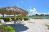 Private Beach w/ tiki's and lounge chairs