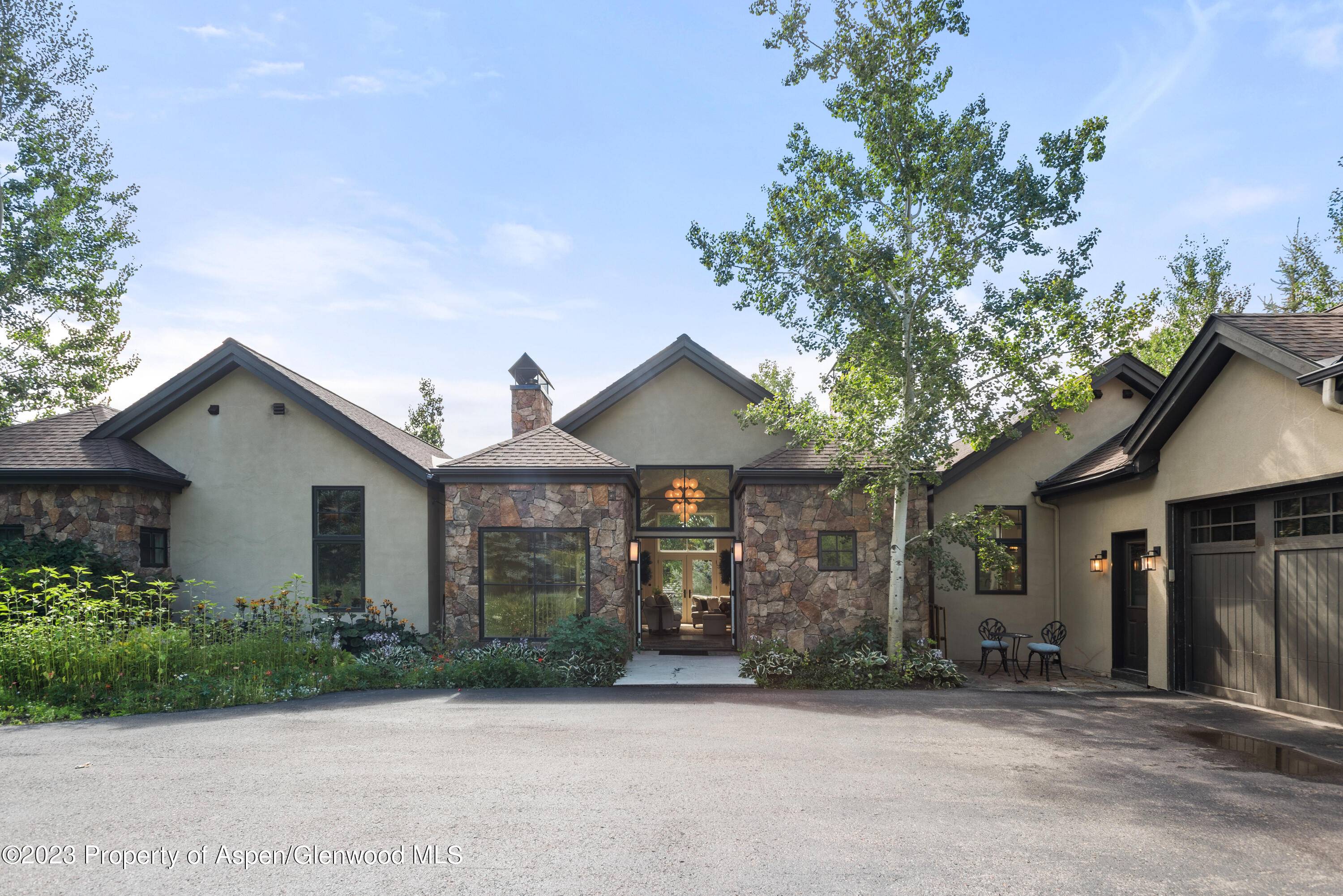 Embrace the alluring charm of this expansive Horse Ranch retreat, boasting 5 bedrooms, each complemented by an ensuite bathroom, and 2 half bathrooms.