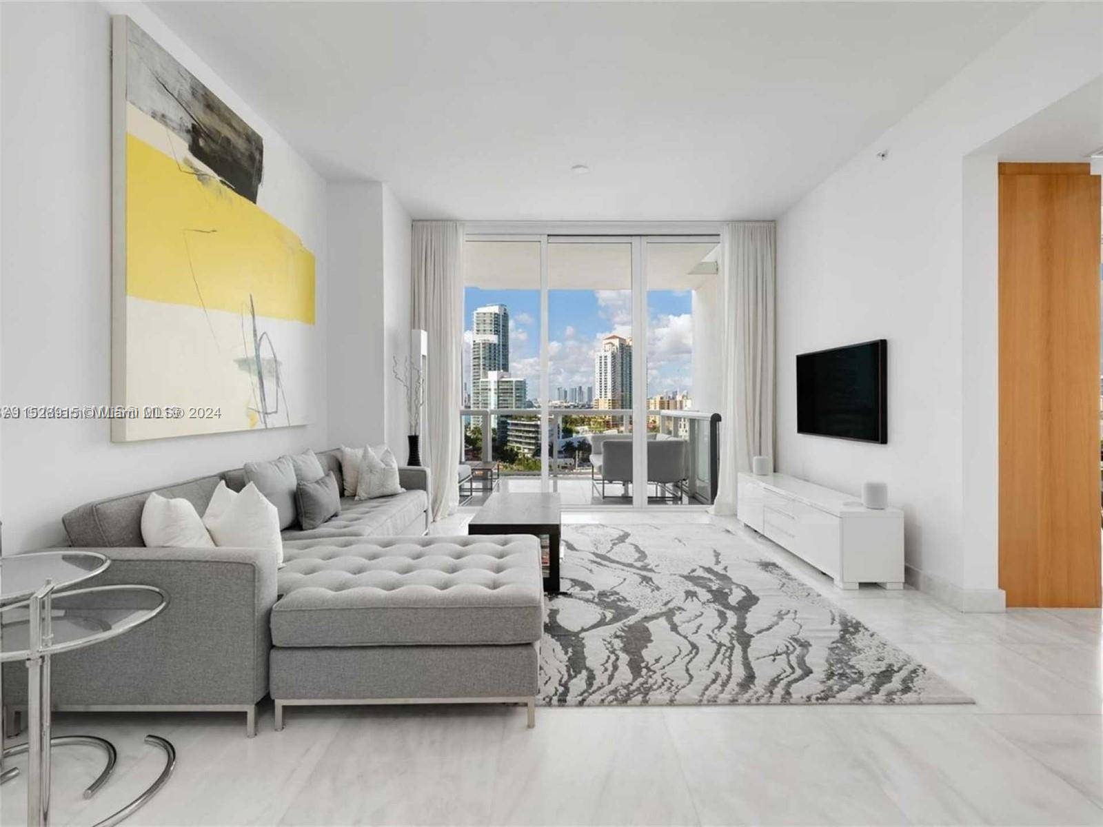 Stunning fully furnished two bedroom, two and a half bathroom corner unit at the Continuum in South Beach.