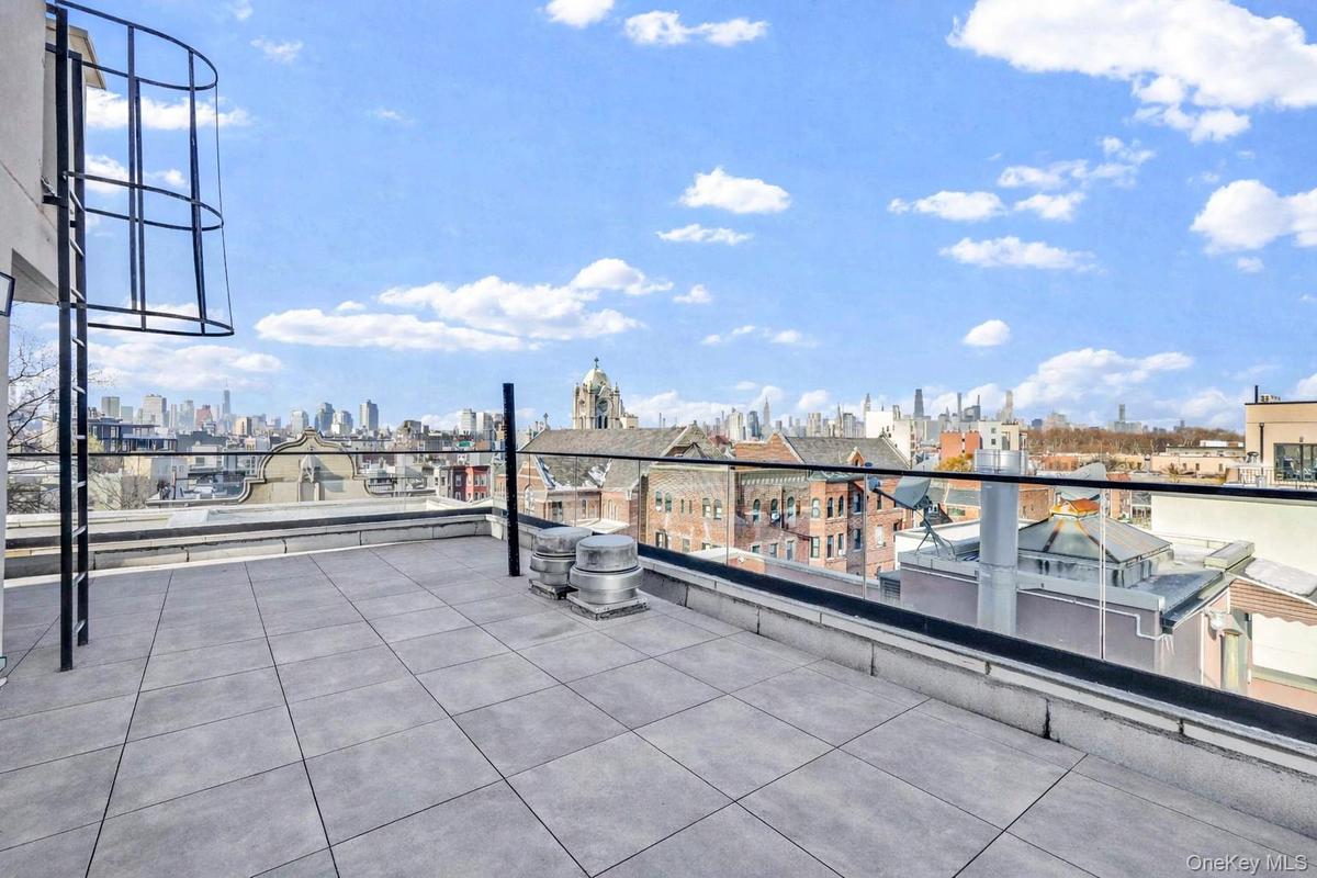View of patio / terrace featuring a skyline view