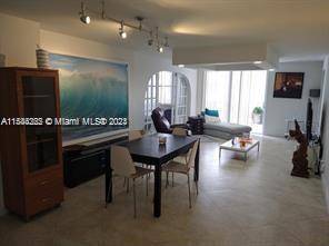 UPDATED 3 BED 2 BATH CORNER UNIT WITH DIRECT OCEAN VIEW.