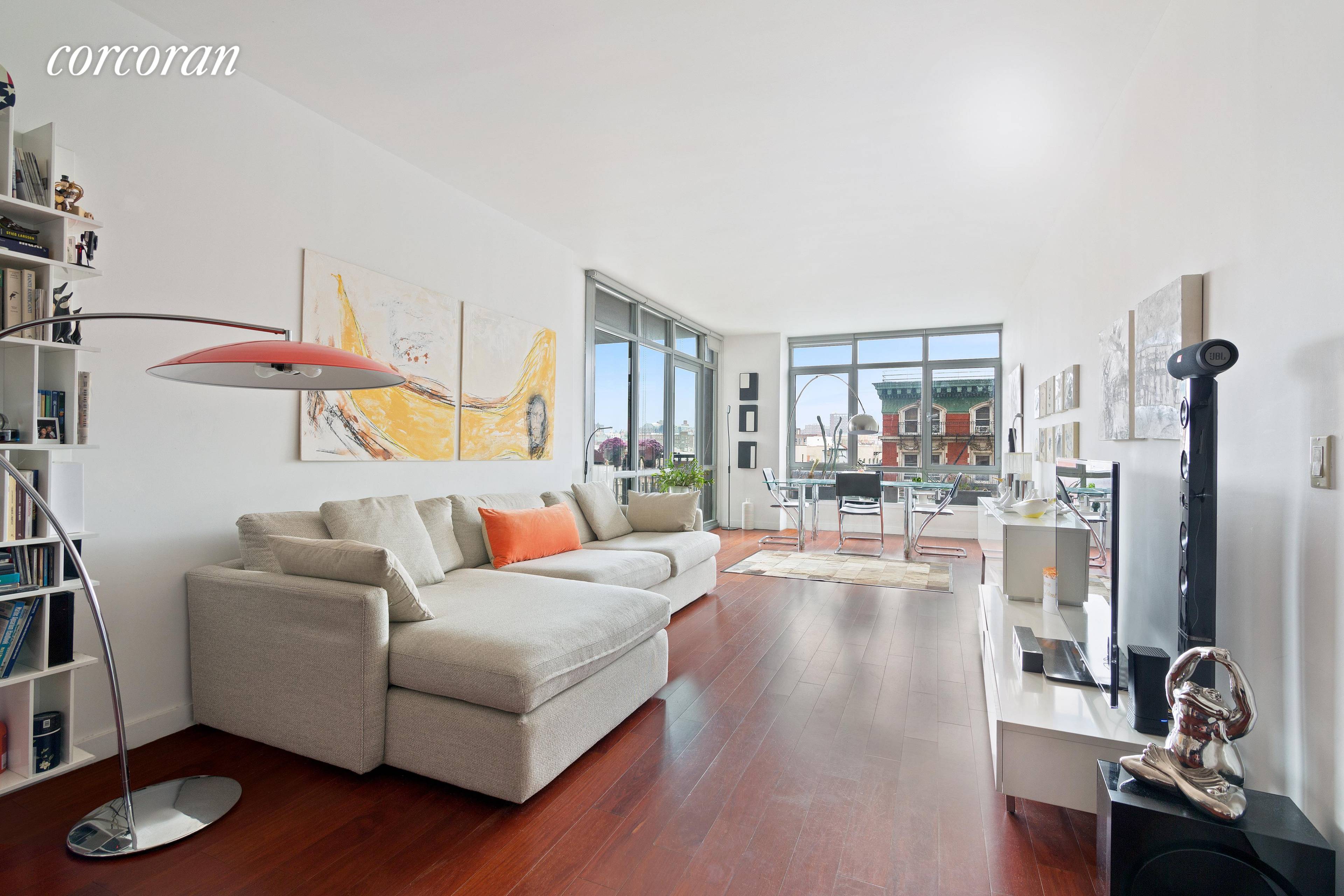 Incredible walls of glass welcome you to this oversized two bedroom, two bathroom residence in one of HarlemA s most desirable, white glove condominiums.