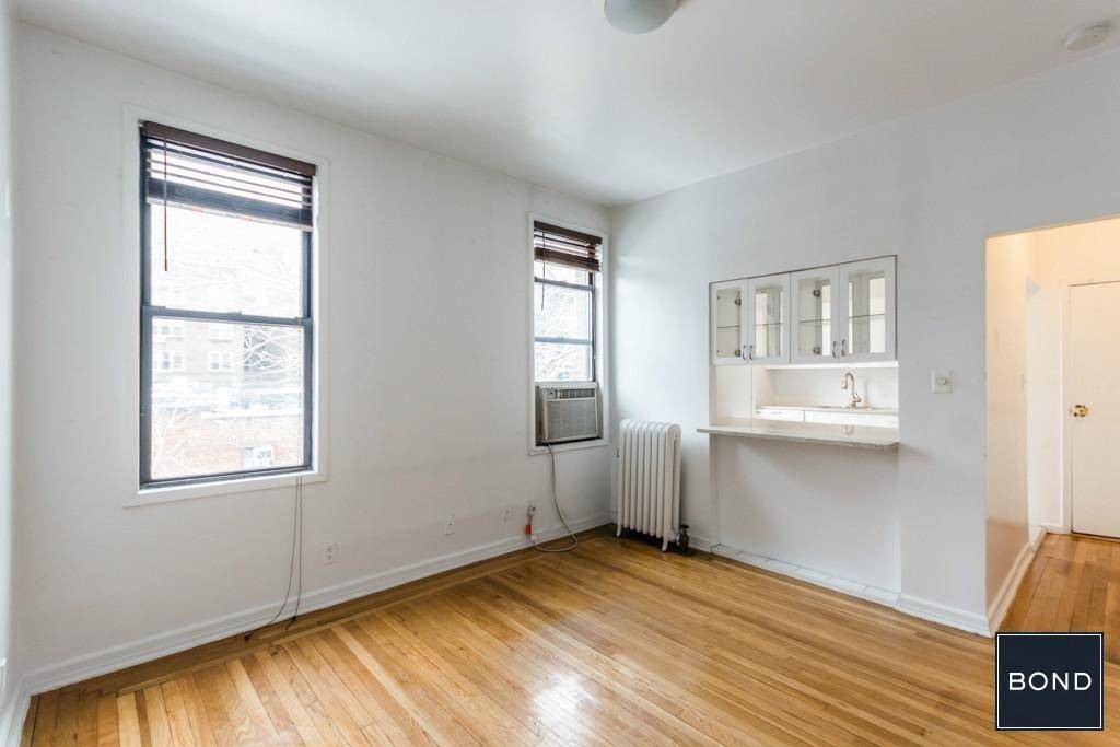 Charming and lovely, corner 2BR apartment on the 2nd floor with a generous living room, a pass thru window to the windowed kitchen that includes a dishwasher and a m ...