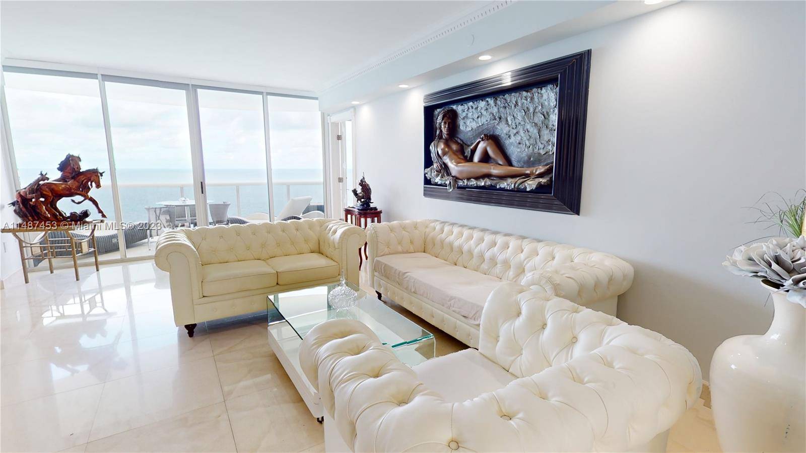 This direct ocean 3 Bedrooms 3 Bathrooms condo boasts a spacious interior with a modern touch.