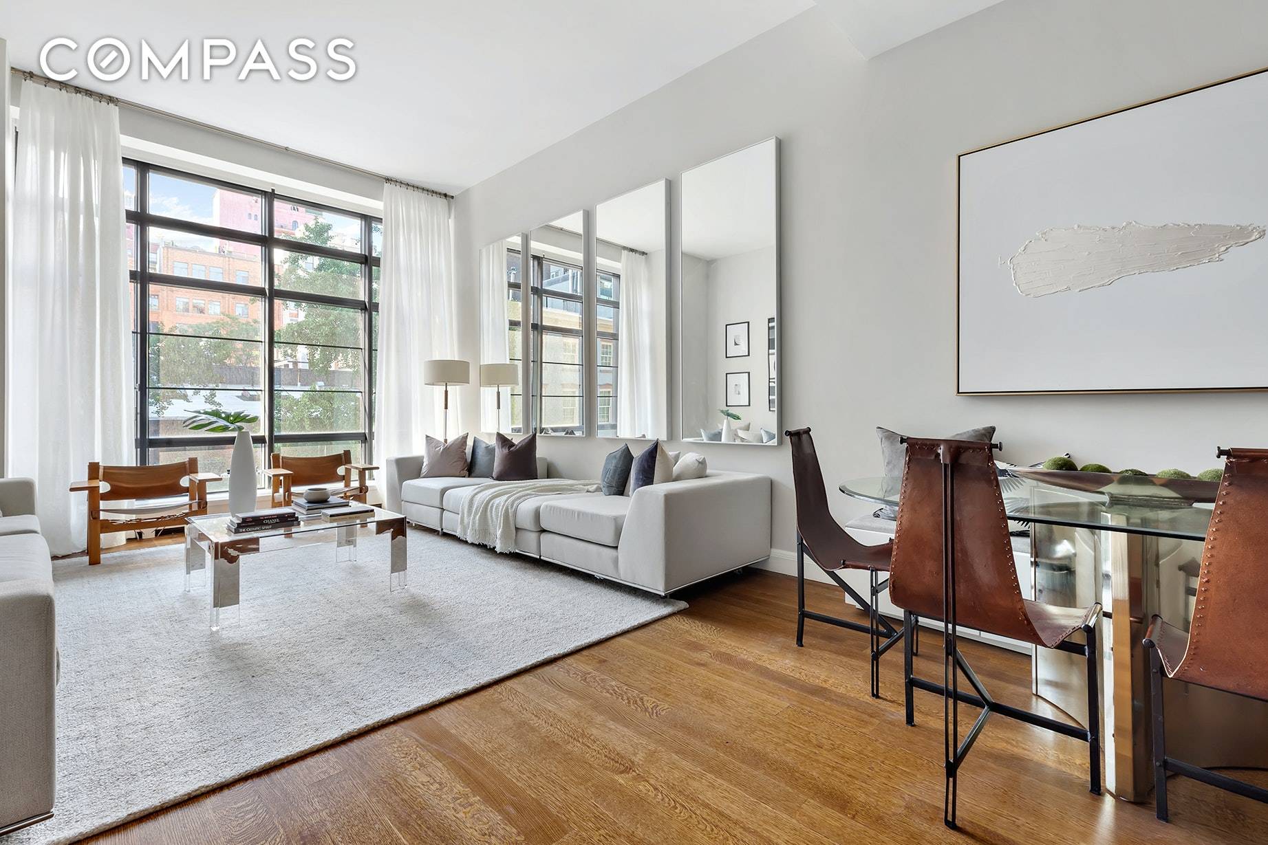 Townhouse living with private garage in a luxury full service West Village Condominium.
