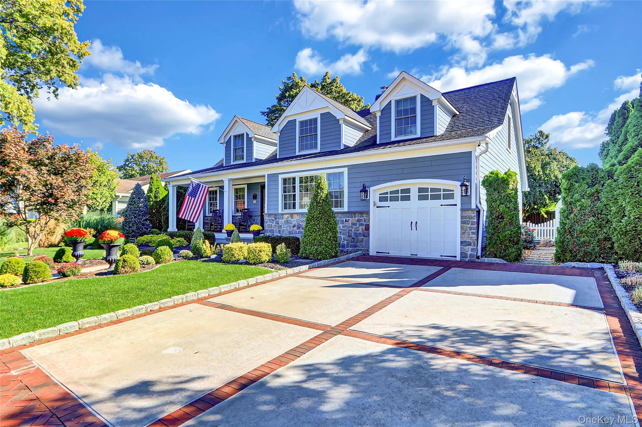 Come on into this beautifully renovated residence where timeless charm meets modern luxury.